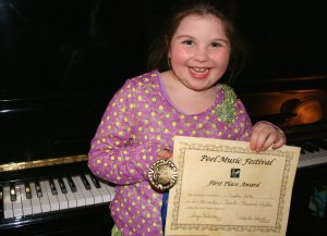 Here I am with my First Place award and a big medal.